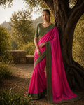 Rani pink satin silk saree with green zardozi-embroidered border