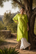 Saunf citrus-green kaftan kurta on model in olive grove